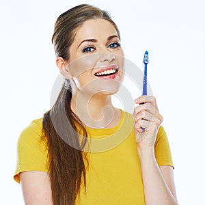 Beautiful woman isolated portrait with toothy brush. Healthy tee