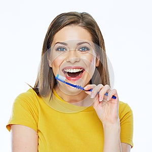 Beautiful woman isolated portrait with toothy brush. Healthy tee