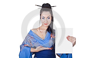 Beautiful woman in a kimono with blank billboard