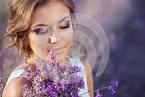 Beautiful woman and a lavender field