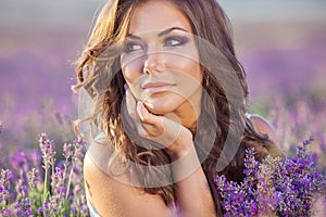 Beautiful woman and a lavender field