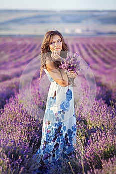 Beautiful woman and a lavender field