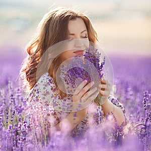 Beautiful woman in a lavender field