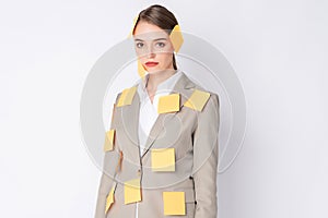 Beautiful woman with light brown suit and post it on her body