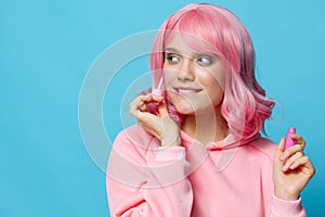 beautiful woman lip gloss makeup pink hair cropped view