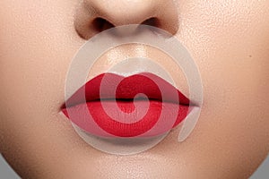 Beautiful Woman Lips with Fashion Mat Lipstick Makeup. Red Lip Make-Up Concept. Beauty Visage. Valentine Day Style