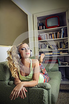 Beautiful woman listening to the music