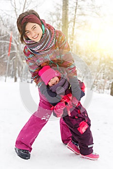 Beautiful woman with little girl