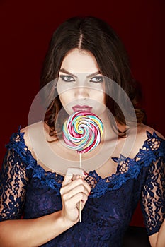 Beautiful woman, Lollipop in hand