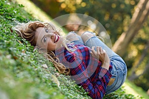 Beautiful woman with long blond curly hair