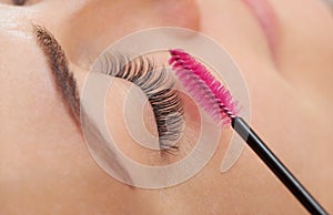 Beautiful Woman with long eyelashes in a beauty salon.