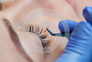 Beautiful Woman with long eyelashes in a beauty salon.