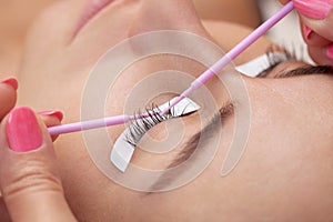 Beautiful Woman with long eyelashes in a beauty salon.