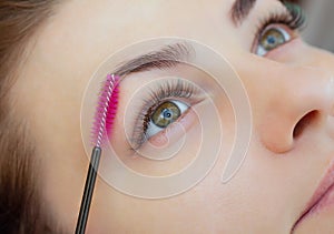 Beautiful Woman with long eyelashes in a beauty salon.