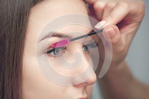 Beautiful Woman with long eyelashes in a beauty salon.