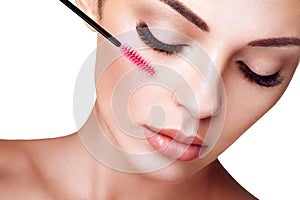 Beautiful woman with long false eyelashes