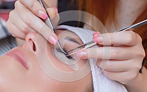 Beautiful Woman with long lashes in a beauty salon.