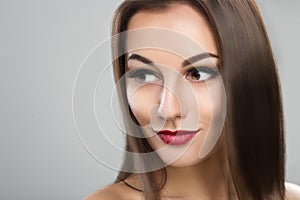 Beautiful woman with long straight brown hair