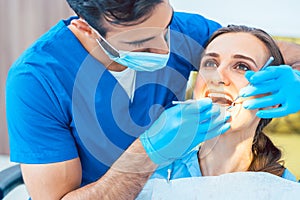 Beautiful woman looking with confidence at her reliable dentist
