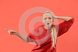 Beautiful woman looking suprised on coral