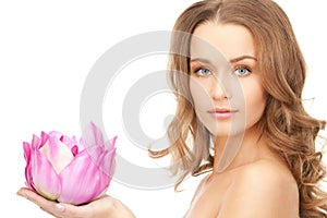 Beautiful woman with lotus flower