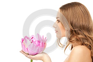 Beautiful woman with lotus flower