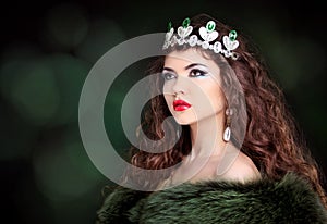 Beautiful woman luxury portrait with long hair in fur coat. Jewelry and Beauty. Fashion art photo