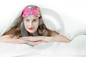 beautiful woman lying on the bed