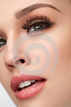 Beautiful Woman With Makeup, Soft Skin And Long Eyelashes