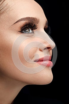 Beautiful Woman With Makeup, Soft Skin And Long Eyelashes