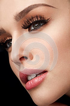 Beautiful Woman With Makeup, Soft Skin And Long Eyelashes