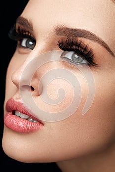 Beautiful Woman With Makeup, Soft Skin And Long Eyelashes