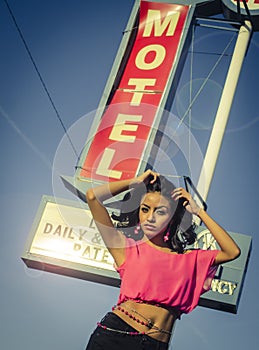 Beautiful woman motel sign