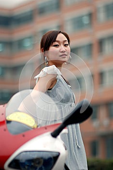 Beautiful woman on Motorcycle