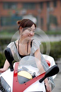 Beautiful woman on Motorcycle