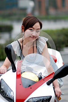 Beautiful woman on Motorcycle