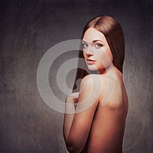 Beautiful woman with naked back portrait