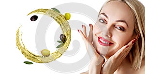 Beautiful woman near circulate olive oil. Skincare concept.