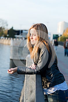 Beautiful woman near fence