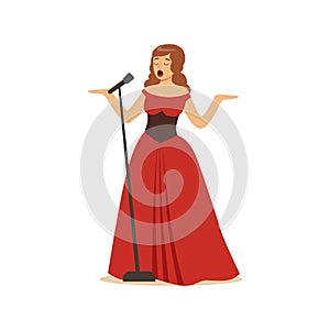 Beautiful woman opera singer in long red dress singing with microphone