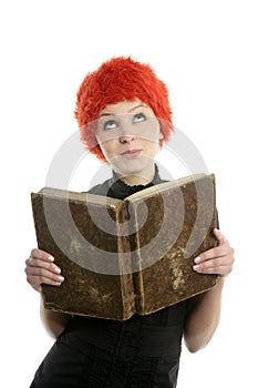 Beautiful woman, orange wig reading old book