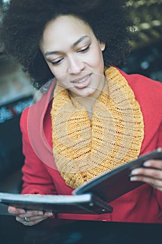 Beautiful woman ordering food in restaurant