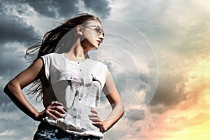 Beautiful woman over sky background