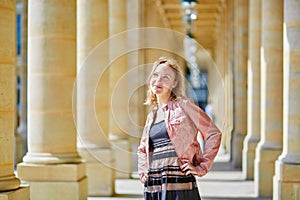 Beautiful woman in Palais Royale in Paris