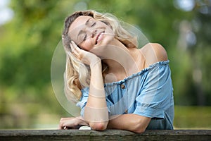 Beautiful woman at park in spring