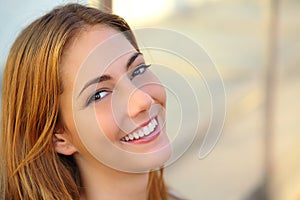 Beautiful woman with a perfect white smile and smooth skin