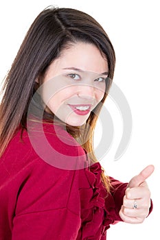 Beautiful woman with perfect white smile with thumb up