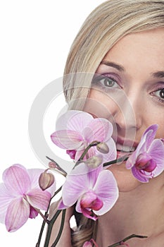 Beautiful woman with phalaenopsis orchids