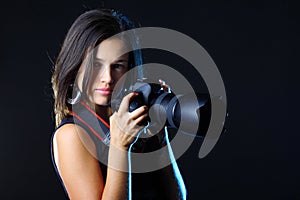 Beautiful woman photographer with camera