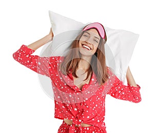 Beautiful woman with pillow and sleep mask on  background. Bedtime